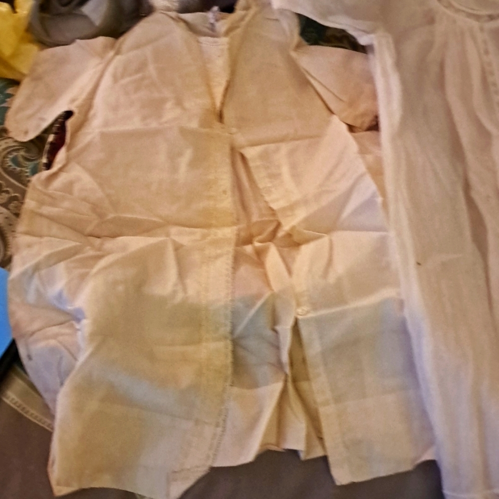 Antique christening gowns in a vintage hat box.  8 gowns in total.